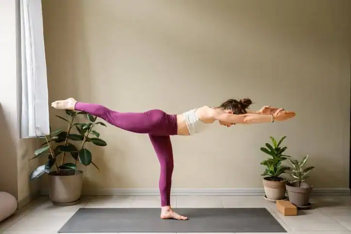Woman doing Yoga exercise Crewe to help with toning the body. 