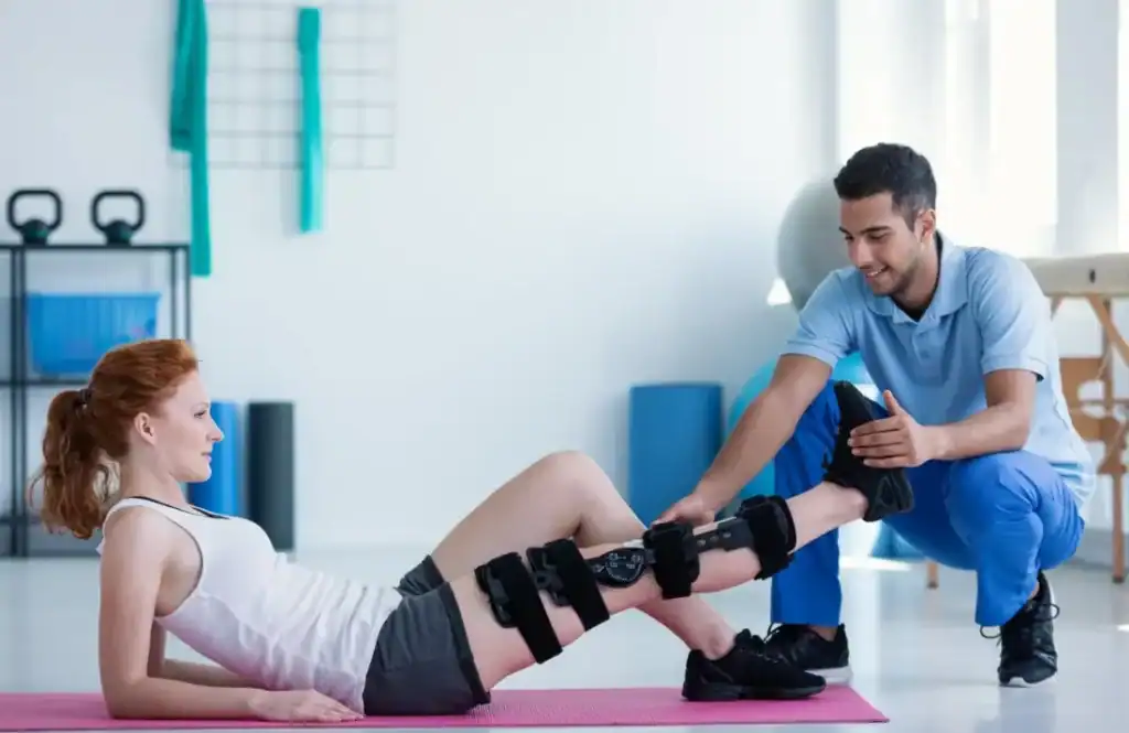 Woman having treatment to help muscle recovery Crewe after an injury